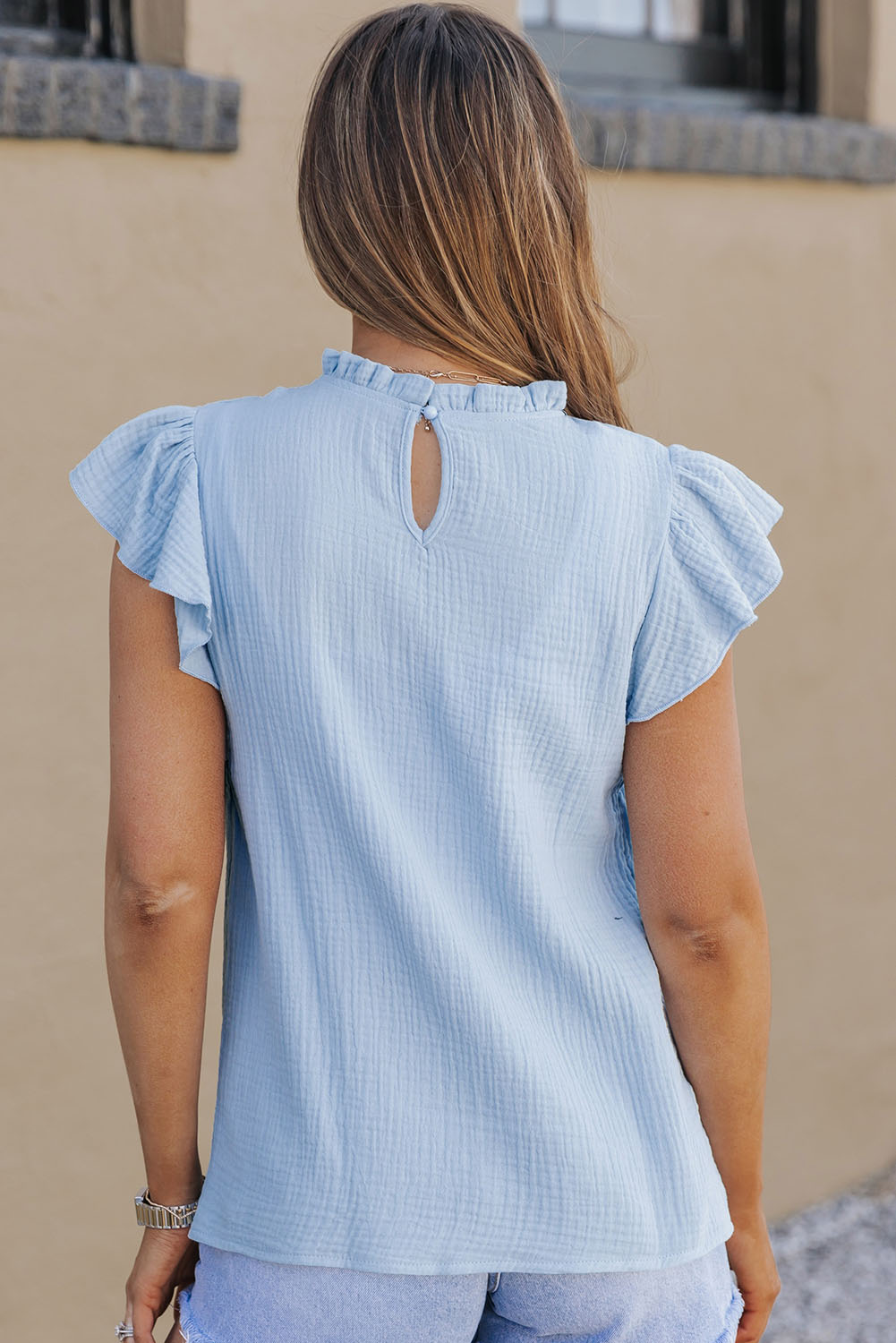 $5.7 Sky Blue Flutter Sleeve Frilled Neck Textured Blouse Wholesale