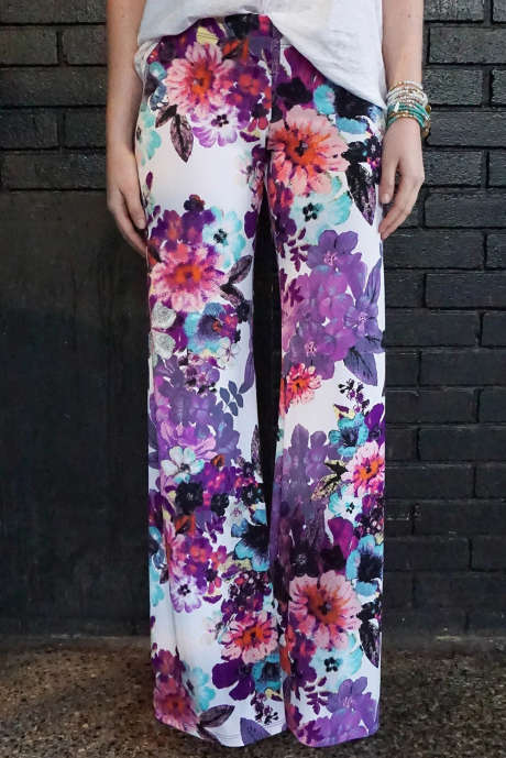 Fialové kalhoty s kravatovým potiskem Flare