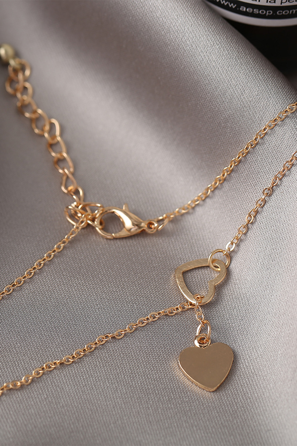 $1.26 Gold Heart Shape Hollow Lariat Necklace Wholesale