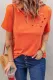 Camiseta de mezcla de algodón con cuello redondo y agujeros naranja