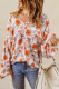 Blusa dolman naranja con cuello en V y estampado floral