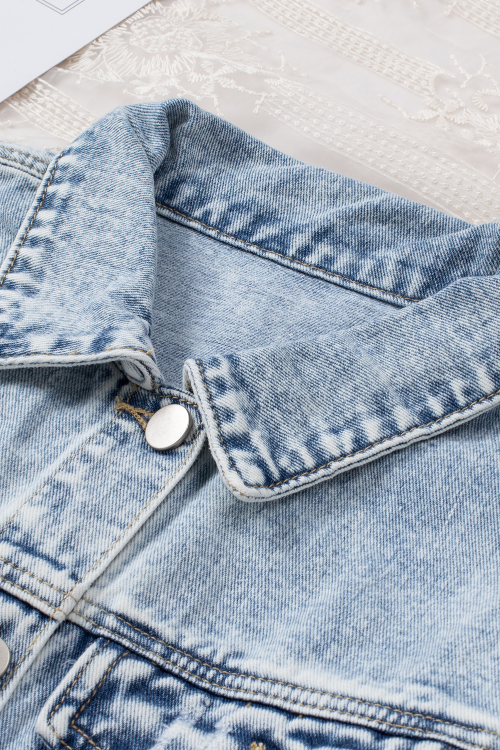 $14.3 Sky Blue Lapel Distressed Raw Hem Buttons Denim Jacket Wholesale