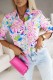 Chemise fourreau boutonnée rose à imprimé fleuri abstrait et manches longues
