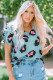 Blusa con estampado de leopardo de manga corta fruncida azul cielo