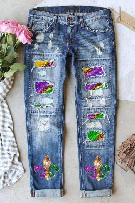 Jeans effetto consumato con toppa Fleur-de-lis Mardi Gras blu cielo lucido