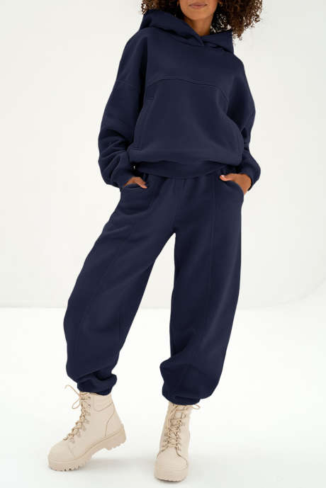 Marineblauwe effen hoodie en joggingbroek met zichtbare naden, actieve kledingset