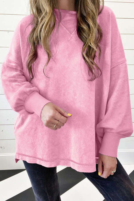 Sudadera con hombros caídos y lavado mineral en rosa fresa