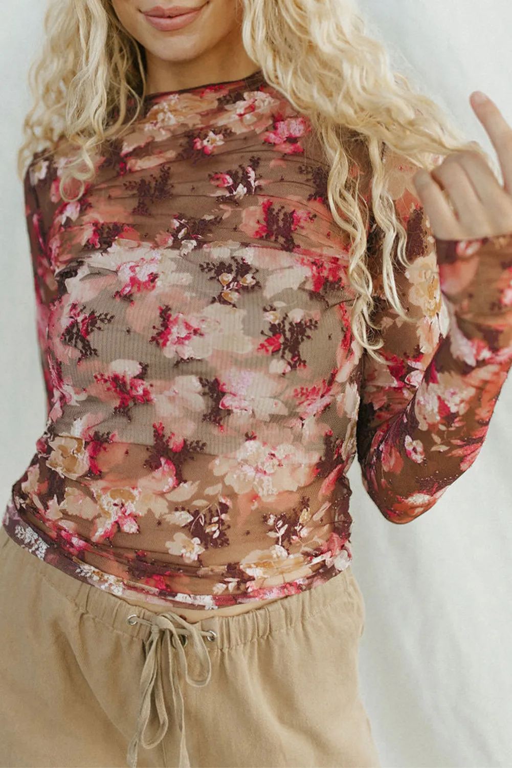 Top de manga larga con estampado floral de malla