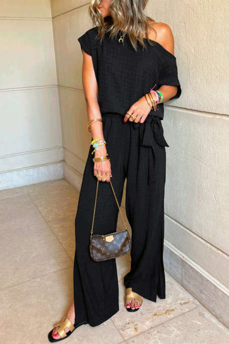 Combinaison noire à carreaux en maille à une épaule et manches courtes avec taille nouée