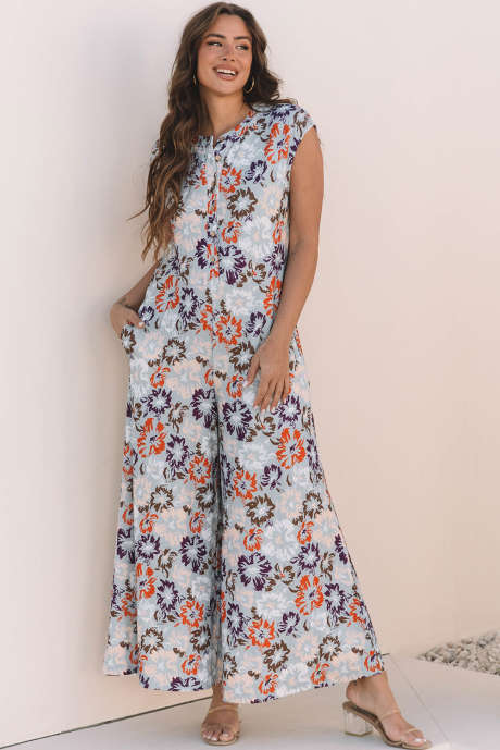 Hemelsblauwe bloemen mouwloze jumpsuit met wijde pijpen en knoopsluiting