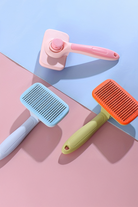 ピンクのセルフクリーニング 優しくグルーミング ブラシ ペット用コーム