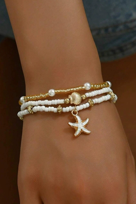 Bracciale elastico a strati con perle di conchiglia di stella marina bianca BH014207-P1