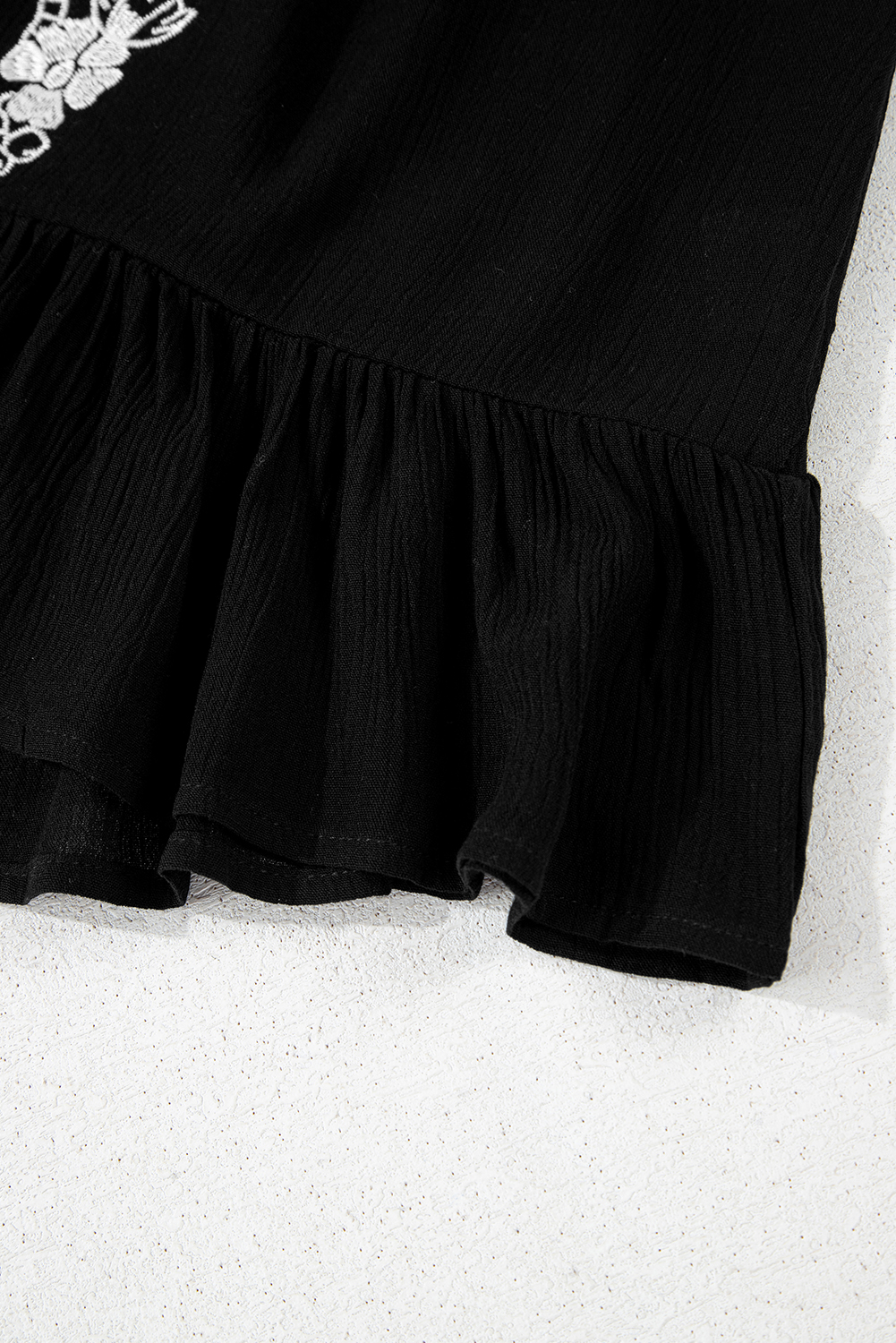 $6.15 Black Floral Embroidery Ruffled Spaghetti Straps Tank Top Wholesale