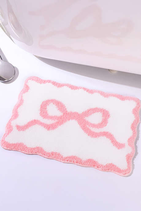 ピンクの蝶結び吸水玄関マット