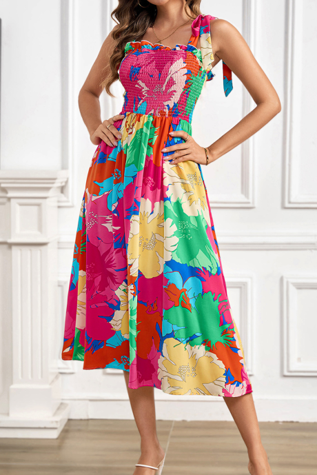 Robe mi-longue taille haute à imprimé floral audacieux et bretelles nouées