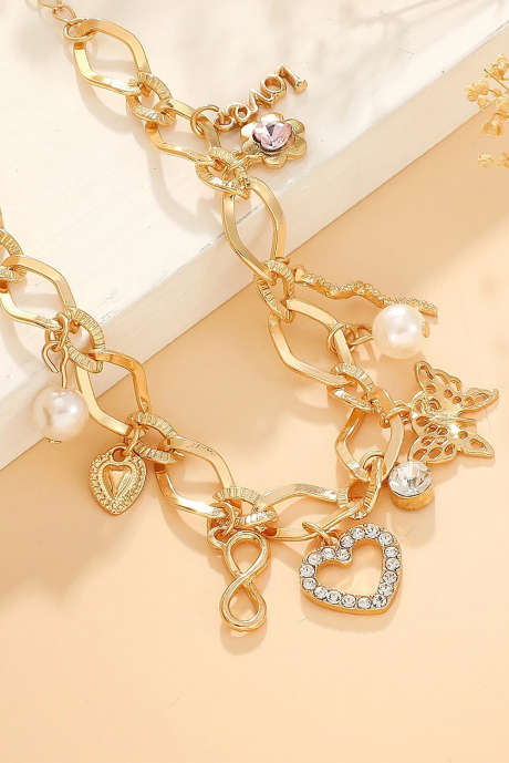 Gold Heart Butterfly Pearl Charm belagt legert armbånd