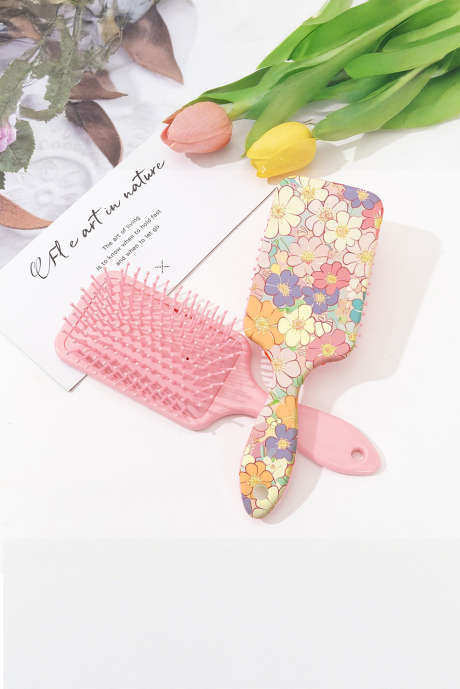 Peine de aire con paleta grande con estampado de flores de melocotón