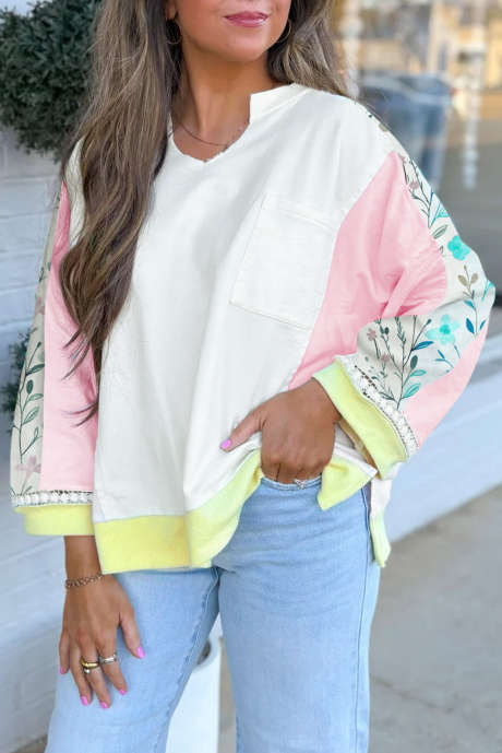 Weißes Langarm-Oberteil mit Blumenmuster und Patchwork in Colorblock-Optik, Brusttasche und eingekerbtem Ausschnitt