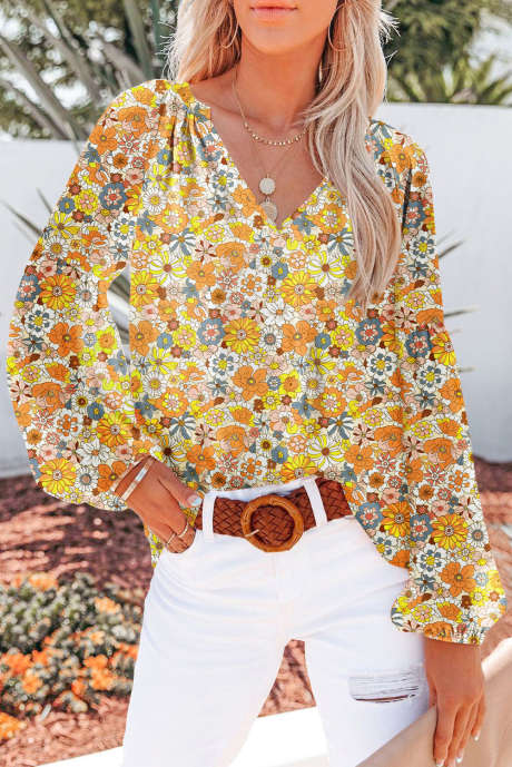 Top con cuello en V y mangas largas abullonadas con estampado floral amarillo