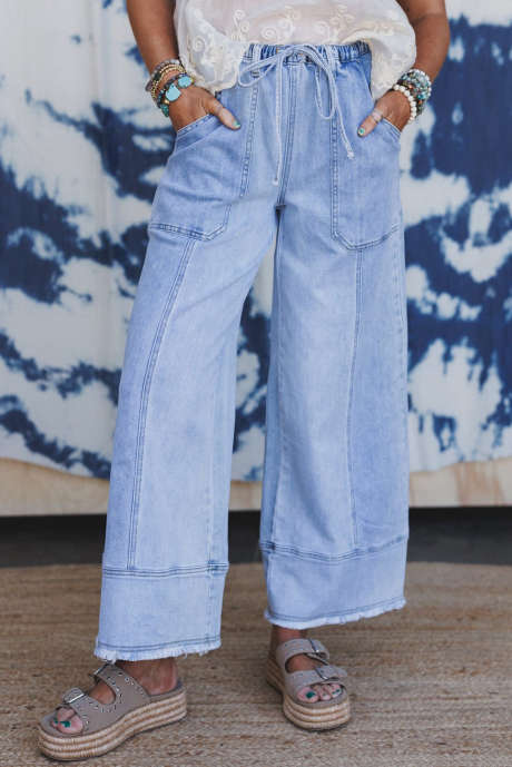 Pantalones vaqueros de pierna ancha con dobladillo sin rematar y detalle de costura con cordón en azul Beau