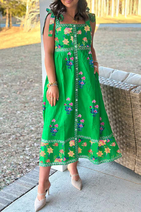 Robe mi-longue à imprimé floral vert et bretelles nouées à bordures contrastées