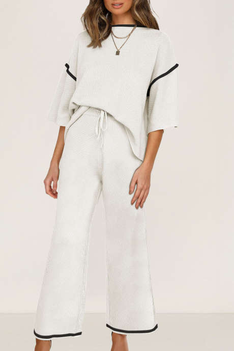 Witte contrasterende top met halve mouwen en trekkoordbroek, losvallend 2-delig trui-pak