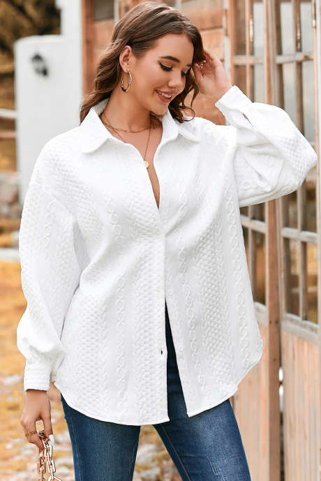 Camicia ampia con maniche a sbuffo e trama a cavo bianco