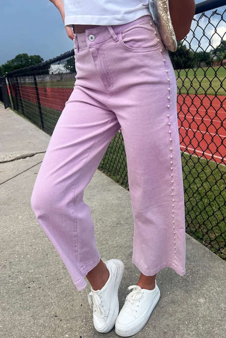 Jean droit longueur cheville à détails latéraux ornés de perles et de bouquets d'orchidées