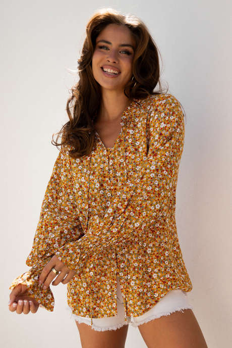 Blusa autunnale con scollo a V e maniche a palloncino con volant e motivo floreale boho arancione