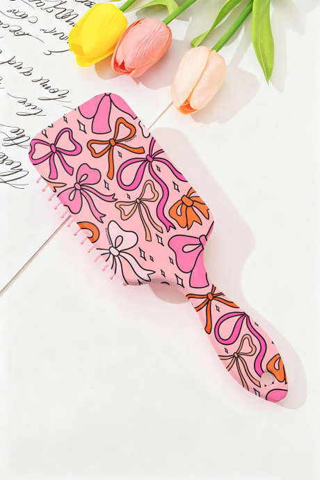 Pente almofada de ar com estampa de laço de fita estrelado em flor de pessegueiro