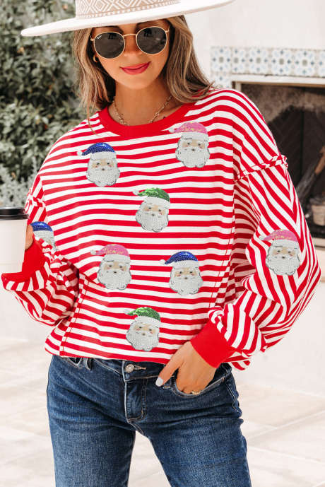 Haut de Noël à manches longues et col rond avec coutures brutes et motif Père Noël à rayures rouges et sequins