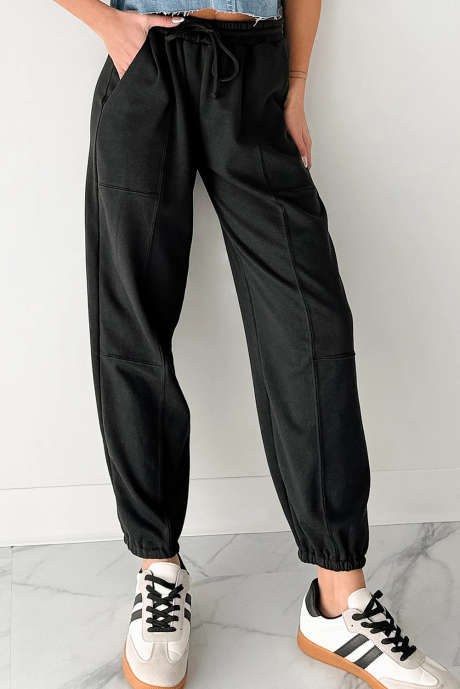 Pantalon de jogging noir uni à coutures apparentes et poches avec cordon de serrage