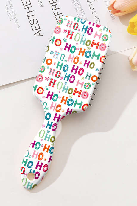 Pettine a cuscino d'aria con stampa natalizia brillante HO HO HO bianco