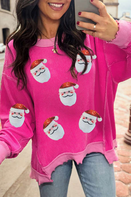 Haut à sequins rose fraise à côtes torsadées et patchwork color block, motif Père Noël