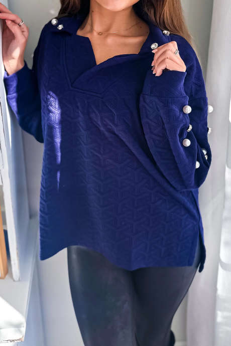 Vuilblauwe gewatteerde textuur met parelmoer en strass-steentjes versierde top met kraag en lange mouwen