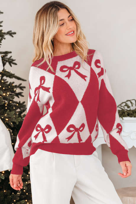 Röd rosettmönstrad tvåfärgad rombstickad lös stickad tröja