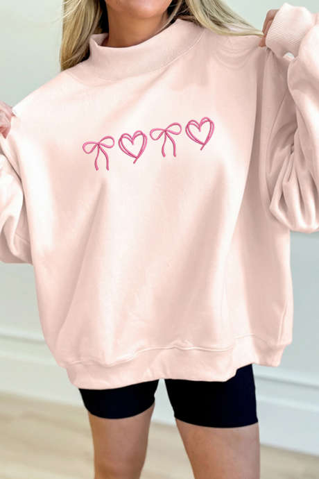 Sweat-shirt à col montant brodé d'un nœud en forme de cœur rose abricot pour la Saint-Valentin