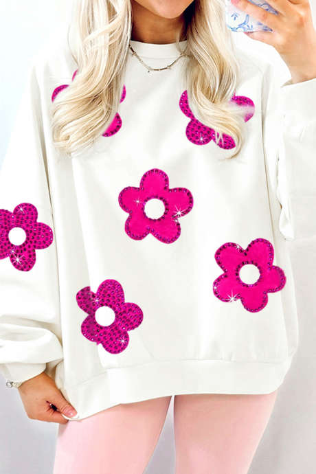 Witte sweater met ronde hals en strassbloemmotief, los model