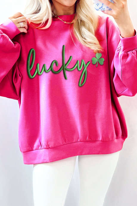 Roze rode trui met geborduurd geluksklavertje, losvallend model.