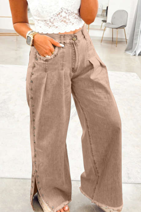 Rookgrijze jeans met studs aan de zijkant, splitpijpen, gerafelde zakken en wijde pijpen