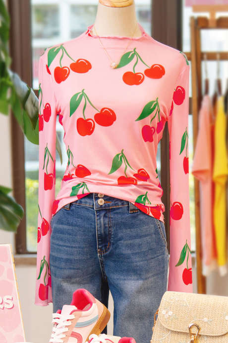 Haut à manches longues en maille à imprimé cerises roses et bordure en laitue