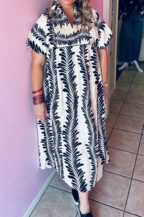 Zwarte /de-overgangsjurk