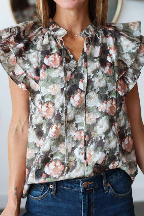 Groene blouse met bloemenprint, dubbele ruches en korte mouwen