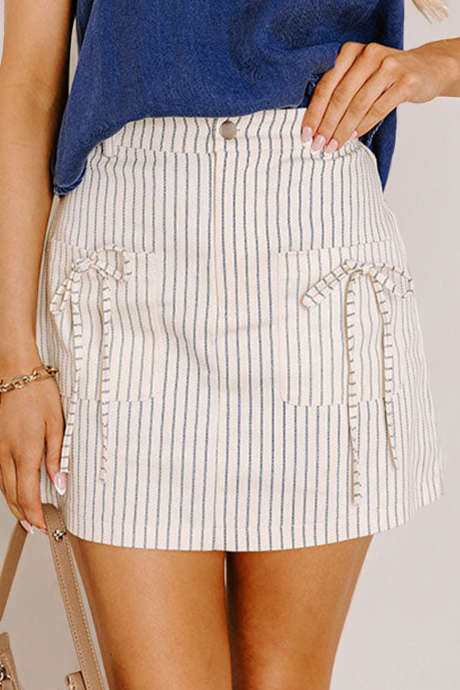 Beige raidallinen rusettikoristeinen taskullinen korkeavyötäröinen minihame