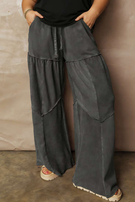 Svarte store størrelser mineralvaskede, synlige sømmer med lappeteppe og snøring