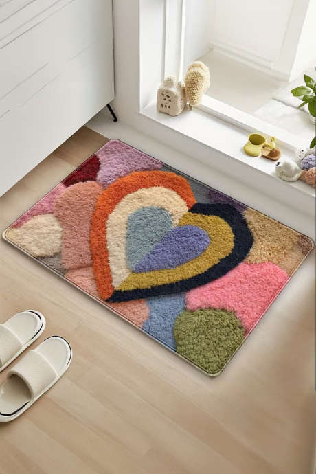 Brun plyschig entrématta med hjärtansmönster