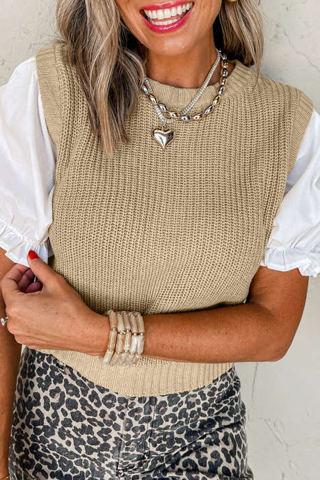 Jasnobeżowy sweter z dzianiny w kontrastowym kolorze z okrągłym dekoltem i krótkim rękawem w stylu patchworkowym