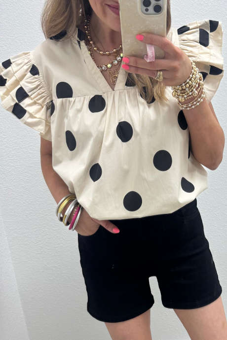 Bluza z mareličnim potiskom in V-izrezom ter nabranimi rokavi