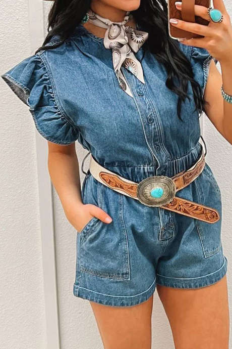 Hämäränsininen farkkutakki, jossa nappiet edessä, leveähihainen cowgirl-haalari