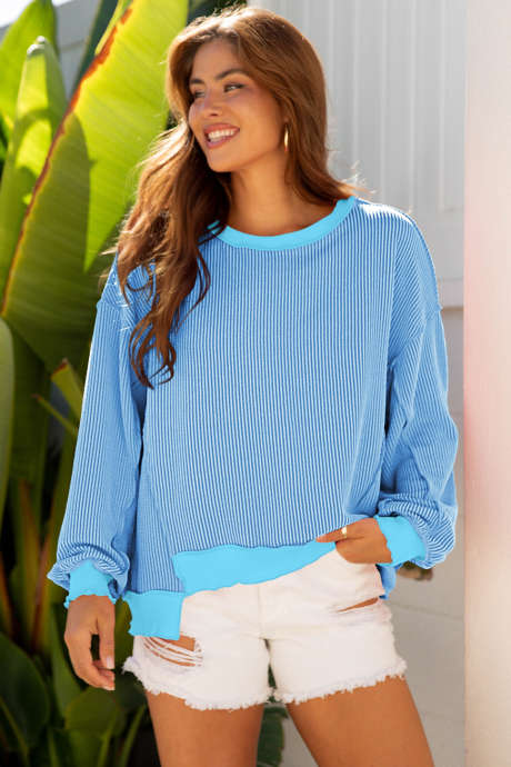 Myosotis Twisted Rib Uneven Hem -olkapäältä laskettava väljä neuletoppi